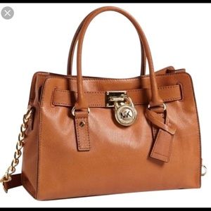 Michael Kors All Leather bag. Negotiable price.